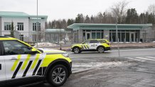 Police cars stand in front of the U.S. Embassy in Oslo, Norway, on March 8, 2026, hours after a loud bang was reported at the site. Oslo police said an explosion at the U.S. embassy in Norway overnight that caused no injuries and minor material damage may have been an act of terror, but stressed police were also investigating other motives.