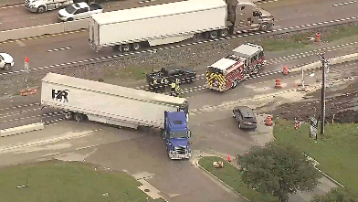 Jack-knifed semi truck near Fate shuts down traffic along WB I-30 for miles