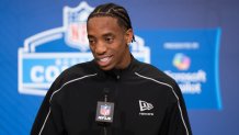 Feb 26, 2026; Indianapolis, IN, USA; Texas defensive back Malik Muhammad (DB23) speaks to members of the media during the NFL Combine at the Indiana Convention Center. Mandatory Credit: Jacob Musselman-Imagn Images