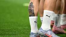 LISBON, PORTUGAL - OCTOBER 14: View of Ruben Neves tattoo in honour of Diogo Jota of Portugal during warm up before the FIFA World Cup 2026 qualifier match between Portugal and Hungary at Estadio Jose Alvalade on October 14, 2025 in Lisbon, Portugal. (Photo by Zed Jameson/MB Media/Getty Images)