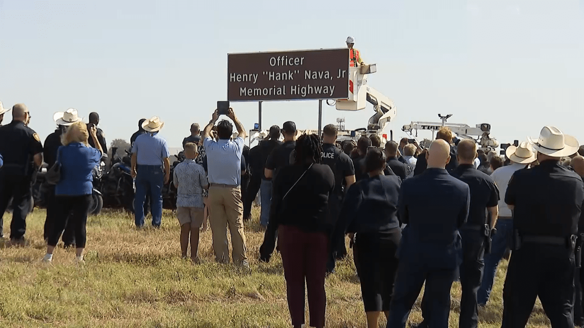 Henry ‘Hank' Nava Jr. highway sign unveiled in front of fallen officer's family