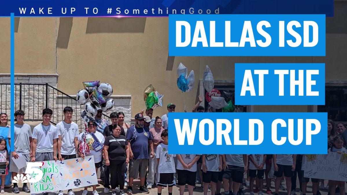 Dallas ISD students escort Spain, Portugal players for the FIFA World Cup match