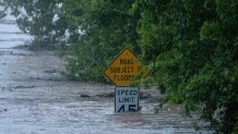 The Pedernales River floods along State Highway 16 on Thursday, July 16, 2026, in Fredericksburg, Texas.