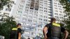 Woman leaps from 11th-floor ledge into firefighter's arms as Berlin high-rise burns