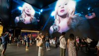 LONDON, ENGLAND - AUGUST 16: The "C'mon Meet Me On The Dancefloor" installation is performed at Outernet London on Au...