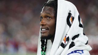 GLENDALE, ARIZONA – AUGUST 22: Ceedee Lamb #88 of the Dallas Cowboys watches from the sidelines during the preseason NFL game against the Arizona Cardinals at State Farm Stadium on August 22, 2026 in Glendale, Arizona.