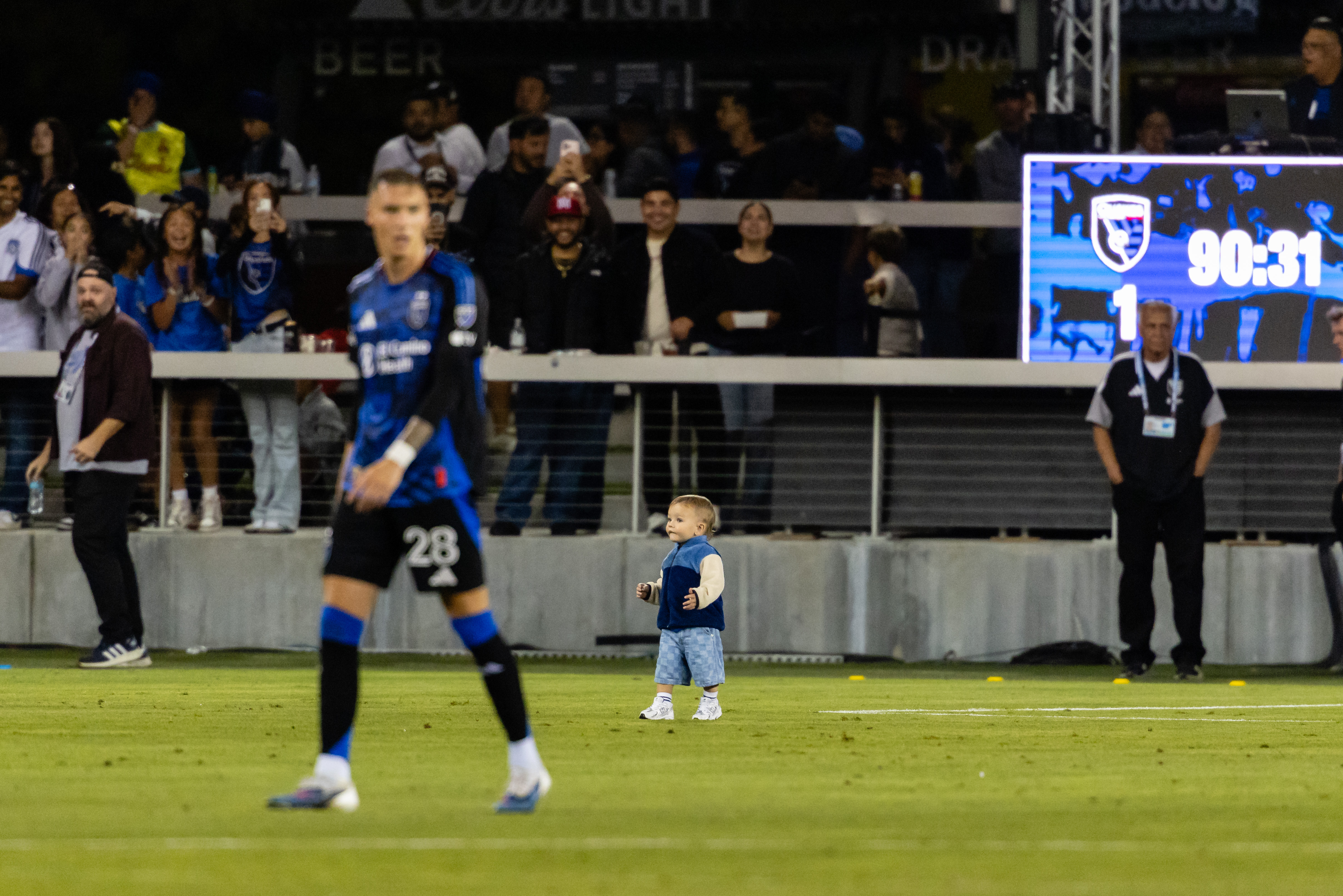 Toddler wanders onto soccer field during MLS game, and the photos are priceless