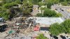 80+ firefighters battle four-alarm fire at Arlington that damages six businesses