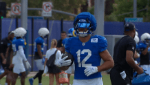 PUKA NACUA AT WOODLAND HILLS TRAINING CAMP 081126 WITH DALLAS COWBOYS; LEFT EARLY WITH INJURY