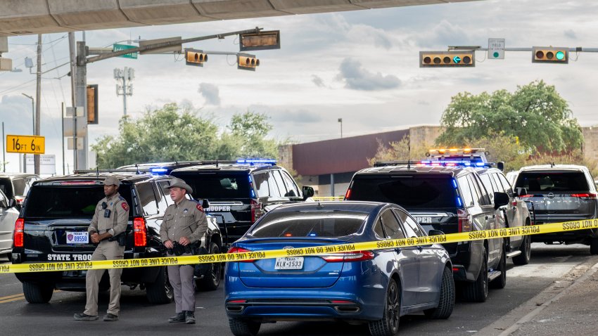 AUSTIN, TEXAS – SEPTEMBER 20: Law enforcement monitor a vehicle that was shot at by Immigration and Customs Enforcement officers on September 20, 2026 in Austin, Texas. A federal ICE officer shot and wounded a person earlier this afternoon in North Austin.  (Photo by Brandon Bell/Getty Images)