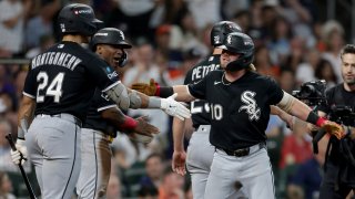 HOUSTON, TEXAS – SEPTEMBER 30: Chase Meidroth #10 of the Chicago White Sox celebrates with Braden Montgomery #24 after hitting a three run home run against the Houston Astros during the sixth inning in game two of the American League Wild Card Series at Daikin Park on September 30, 2026 in Houston, Texas.  (Photo by Kenneth Richmond/Getty Images)