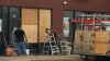 Man injured, businesses damaged following shooting in Arlington