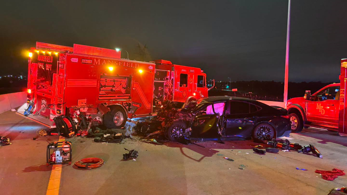 Vehicle slams into Mansfield fire engine protecting crash scene
