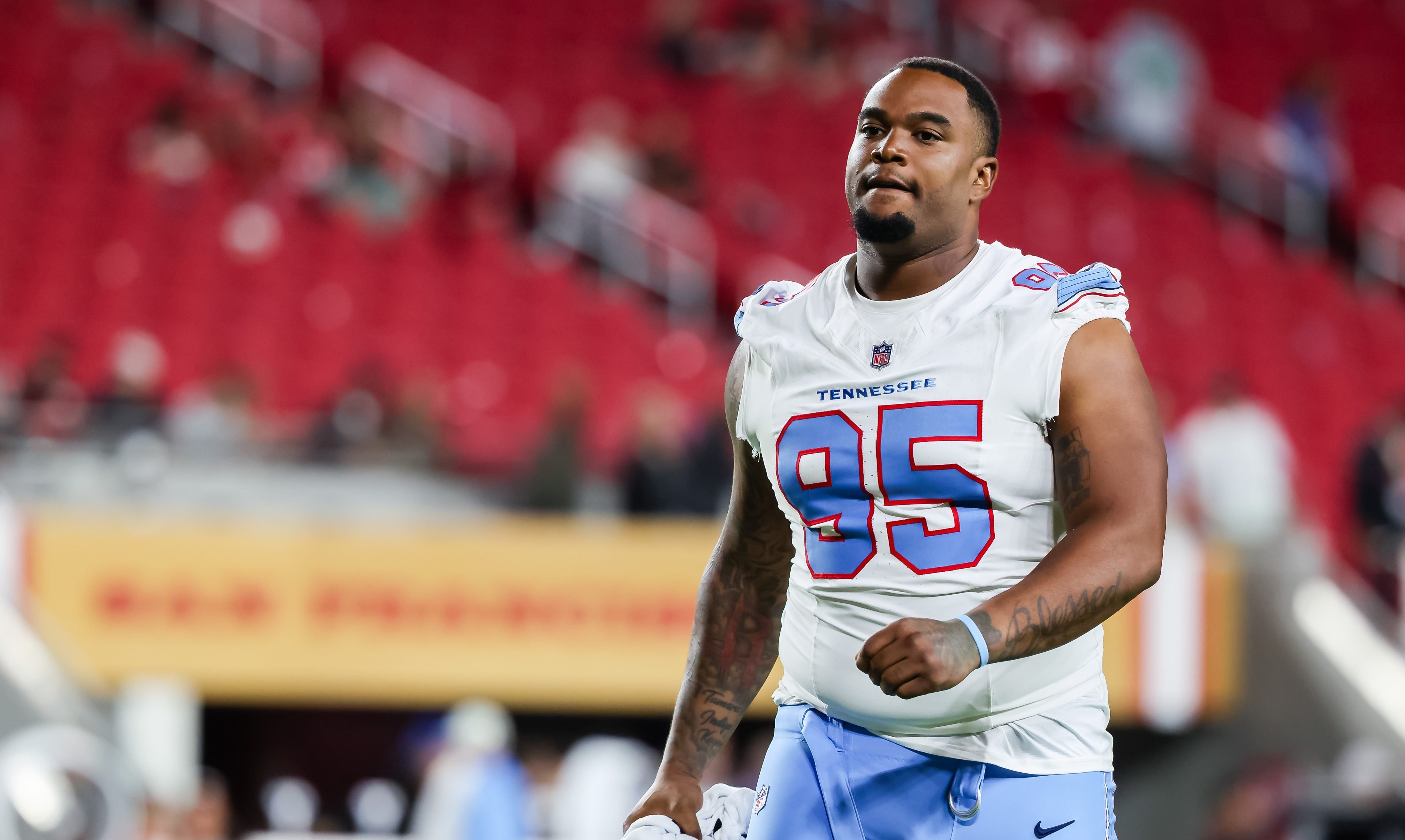 Titans released Jordan Elliott after he pulled out gun in parking lot, head coach says