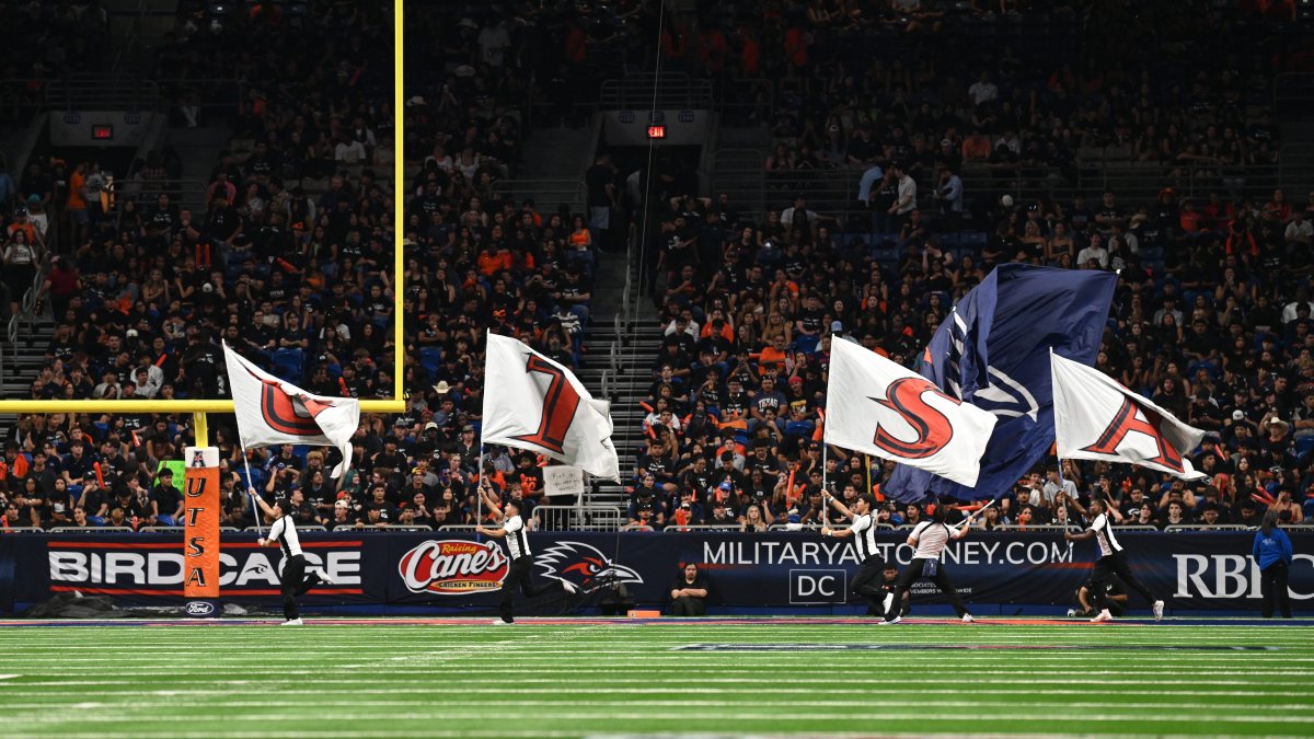 Service member dies after falling from stadium rafters at college football game