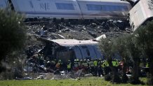 Emergency teams work at the scene of a collision involving two high-speed trains near Urda station in Toledo province, Spain, on Oct. 28, 2026. Authorities are investigating the cause of the collision. 