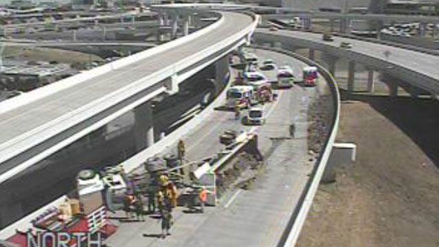 18-Wheeler Overturns, Spills Dirt on Dallas Ramp