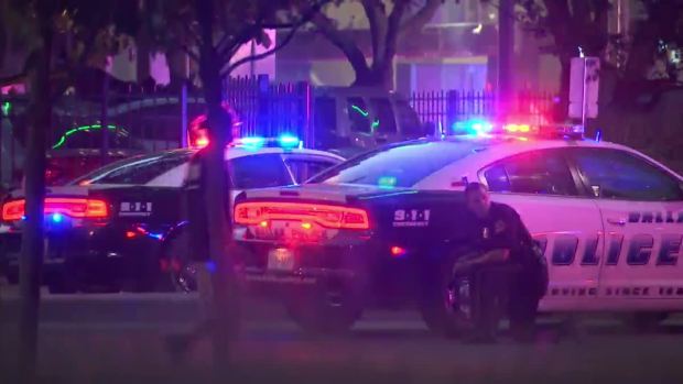 Officers Take Cover After Shots Fired Downtown