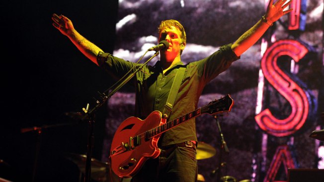 Josh Homme releases video apology for kicking photographer Josh Homme releases video apology for kicking photographer