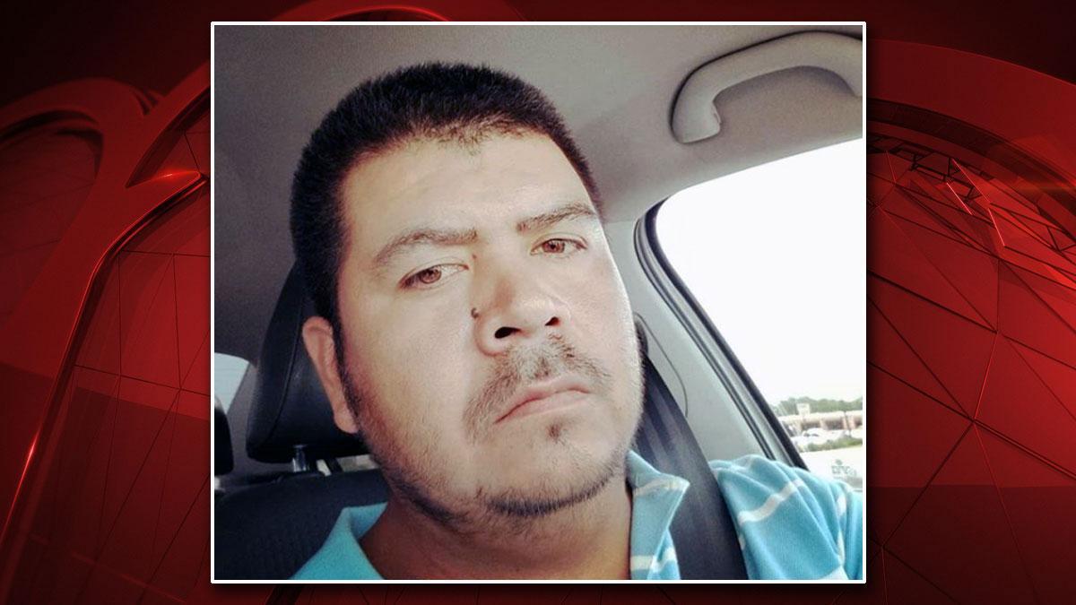 Police: Man Wanted in Relation to Murder Remains 'At-Large'