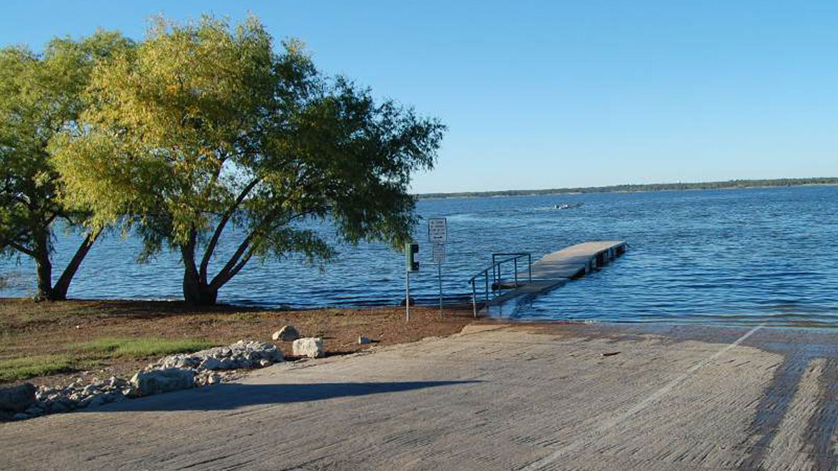 Rescue Workers Search for Person at Grapevine Lake
