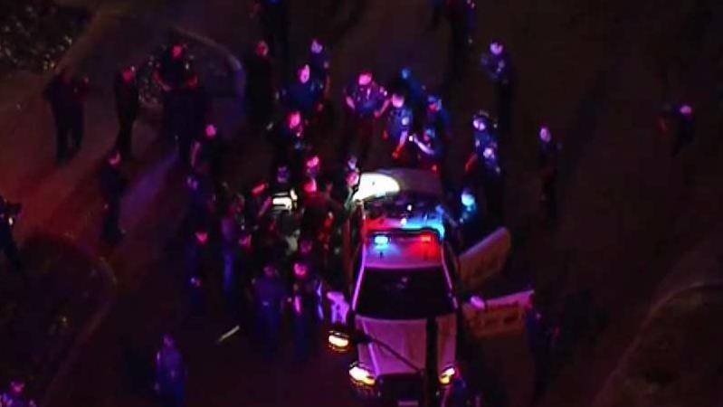 'Person of Interest' in Officer Shooting Arrested After Police Chase