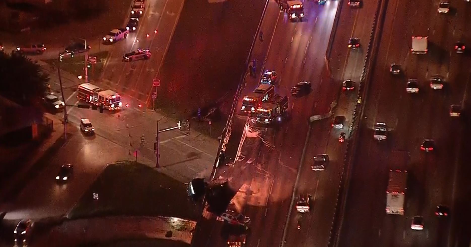 Driver Dies After Semi Catches Fire, Hangs Off Bridge