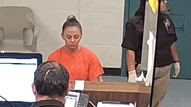 Video Shows Amber Guyger Booked Into Jail Sunday Night