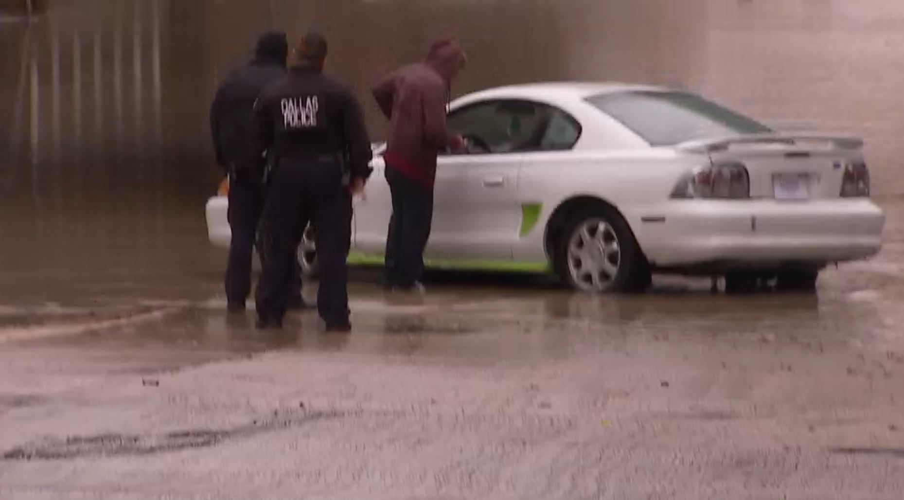 Man's Car Washed Away By Fast-Moving Water