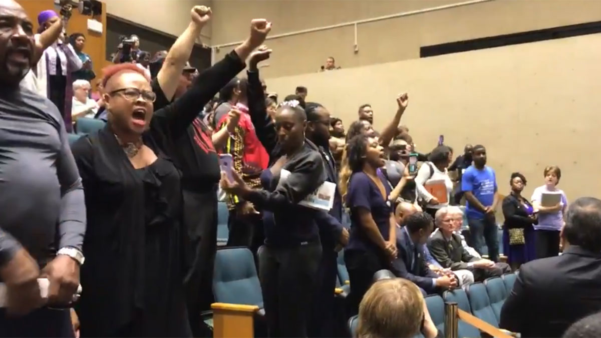 Protestors Condemn Jean Shooting, Disrupt City Council
