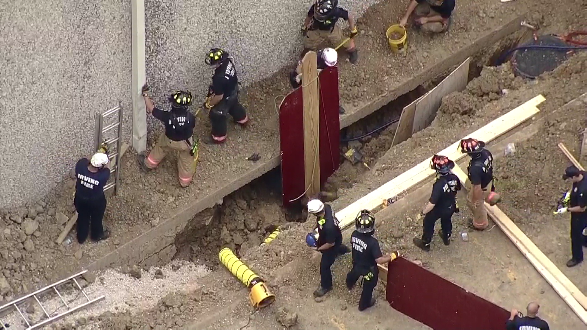 Crews Rescue Man Trapped in a Trench