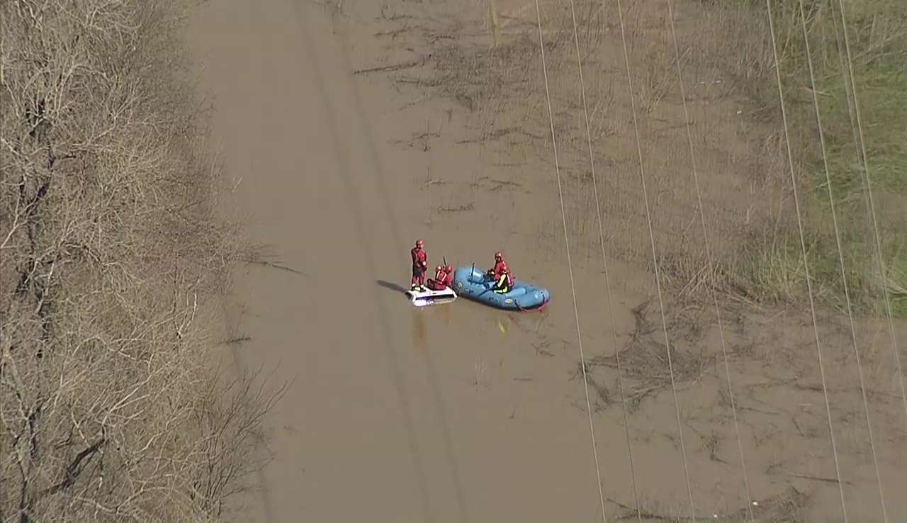 Crews Recovering Truck With Body Inside From River