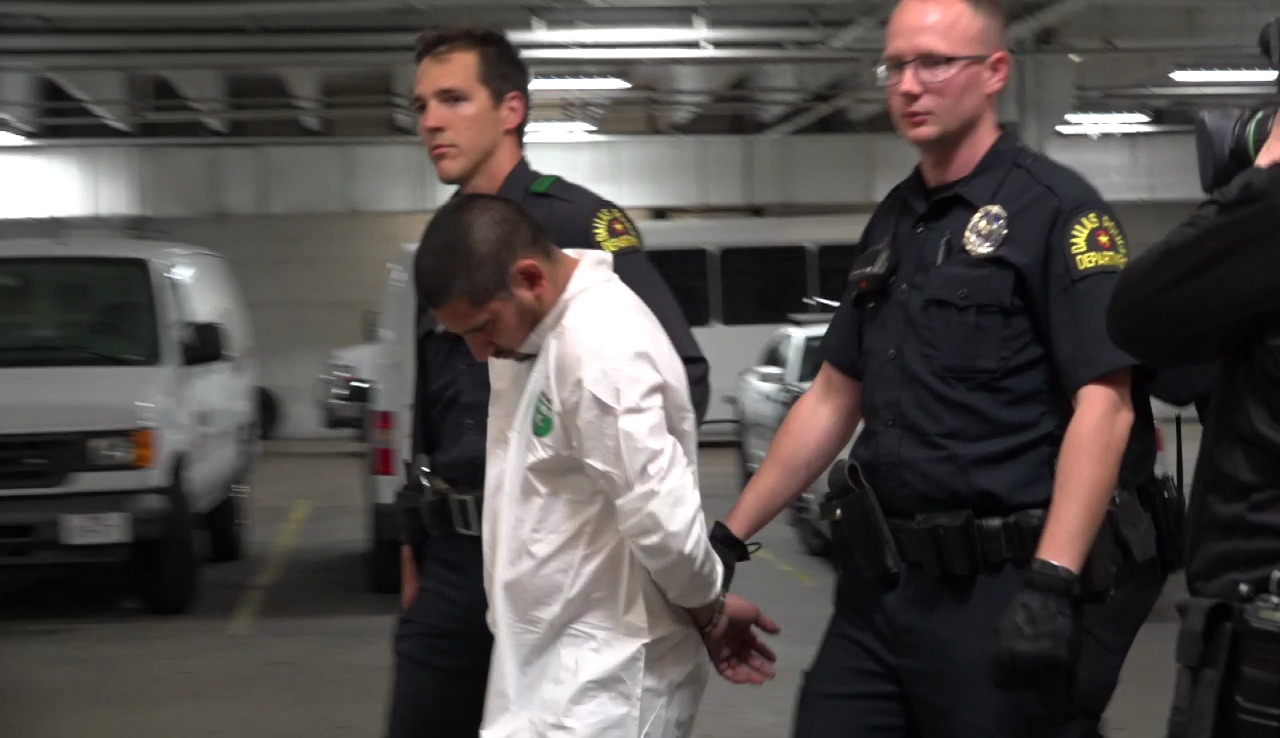 Raw: Police Shooting Suspect Booked Into Jail